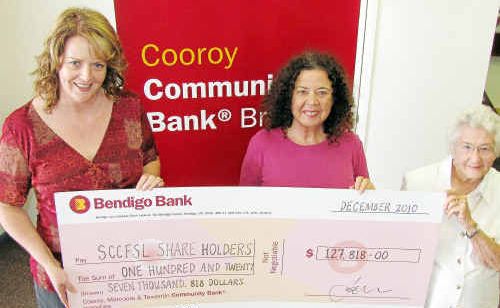 Cooroy Community Bank manager Fiona Hutchings with two of the shareholders. Cooroy Community Bank manager Fiona Hutchings with two of the shareholders.